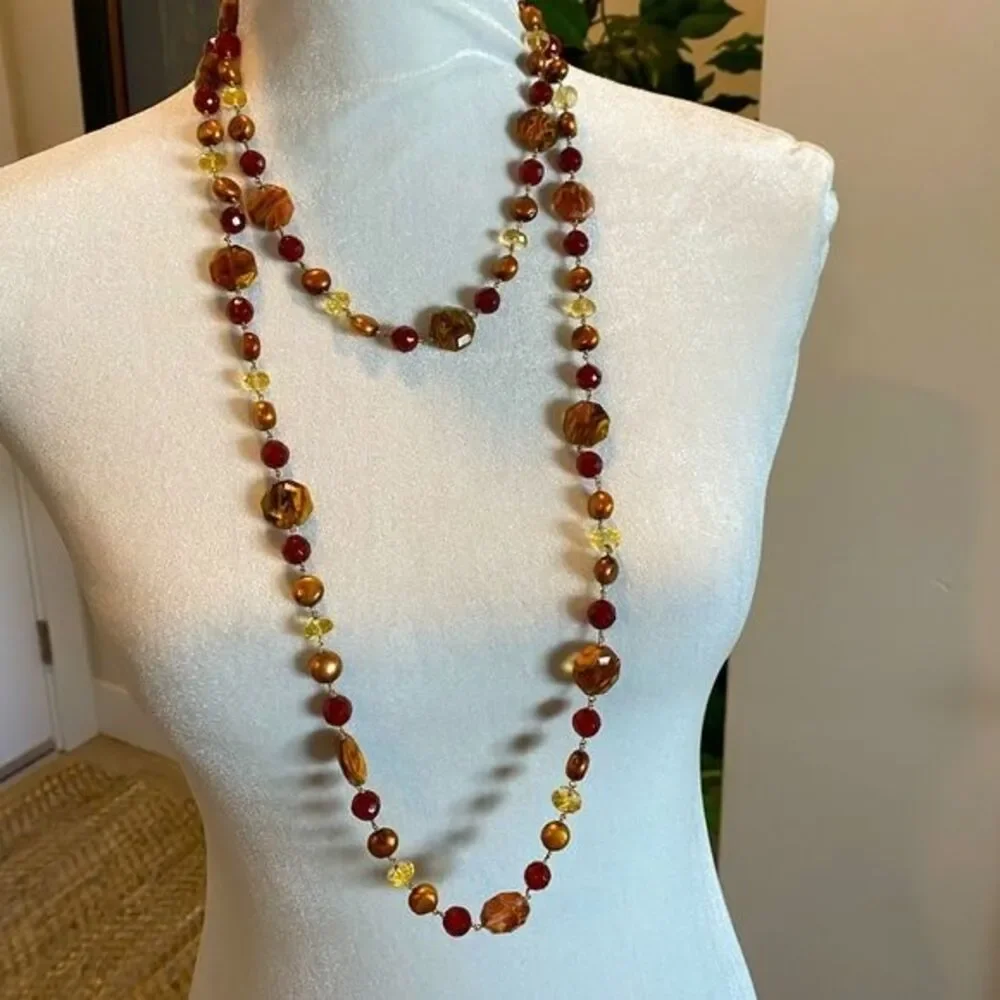 Double strand necklace Unique blend of beads and pearls. Toggle closure